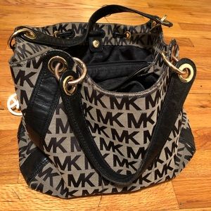 Used Michael Kors purse with matching wallet